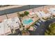 Aerial view of community pool and common areas, with nearby parking at 5100 N Miller Rd # 24, Scottsdale, AZ 85250