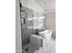 Modern bathroom featuring a stylish glass shower and soaking tub at 5259 W Village Dr, Glendale, AZ 85308