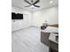 Bedroom featuring a ceiling fan, and shuttered window at 5259 W Village Dr, Glendale, AZ 85308