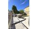 Outdoor kitchen with stainless steel grill and stone countertops at 5259 W Village Dr, Glendale, AZ 85308