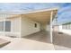 Large carport providing covered parking with convenient access to the home's entrance and extra storage space at 5735 E Mcdowell Rd # 447, Mesa, AZ 85215