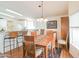 Welcoming dining area featuring a wooden table, seating for six, and lots of natural light at 5735 E Mcdowell Rd # 447, Mesa, AZ 85215