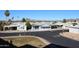 Neighborhood streetscape showing multiple single-Gathering homes and mountain views at 5735 E Mcdowell Rd # 447, Mesa, AZ 85215