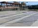 Community shuffleboard court with covered seating area in the background at 5735 E Mcdowell Rd # 447, Mesa, AZ 85215