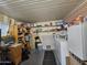 Organized utility room featuring ample shelving, cabinets, and a modern washer and dryer, maximizing storage space at 650 N Hawes Rd # 4508, Mesa, AZ 85207