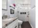 Stylish bathroom featuring a frameless glass shower, granite counters, and modern fixtures at 6707 E Aire Libre Ln, Scottsdale, AZ 85254