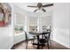 Bright breakfast nook with a round table and a view of the backyard at 6707 E Aire Libre Ln, Scottsdale, AZ 85254