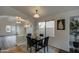 Dining area with a contemporary table setting, creating an inviting space for meals and gatherings at 6709 S 49Th Dr, Laveen, AZ 85339