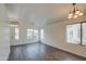 Bright living room featuring hard surface floors and multiple windows for lots of natural light at 6709 S 49Th Dr, Laveen, AZ 85339