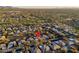 Aerial view of the home in a beautiful community with lush green spaces and mountain views at 6993 E Soaring Eagle Way, Scottsdale, AZ 85266