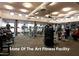 State-of-the-art fitness center with a variety of exercise machines and ample natural light at 6993 E Soaring Eagle Way, Scottsdale, AZ 85266