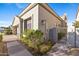 Landscaped side yard and charming facade create a welcoming atmosphere at 8100 E Camelback Rd # 43, Scottsdale, AZ 85251