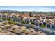 View of a desert neighborhood surrounded by mature trees and desert mountains at 8100 E Camelback Rd # 43, Scottsdale, AZ 85251