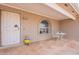 Welcoming front patio with seating area, perfect for relaxing and enjoying the neighborhood at 8147 E Lakeview Ave, Mesa, AZ 85209