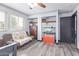 Bedroom featuring a seating area, closet, and fish tank, offering a versatile and personalized space at 921 S Val Vista Dr # 59, Mesa, AZ 85204