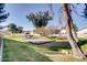 Community park showcasing a playground and mature shade trees, enhancing outdoor recreation at 921 S Val Vista Dr # 59, Mesa, AZ 85204