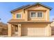 Charming two-story home with a two-car garage and covered entryway at 921 S Val Vista Dr # 59, Mesa, AZ 85204