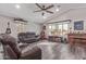 Comfortable living room featuring wood floors, leather furniture and lots of light at 921 S Val Vista Dr # 59, Mesa, AZ 85204