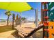 A fun playground with a variety of equipment for children to climb, balance, and explore at 9303 E Static Ave, Mesa, AZ 85212