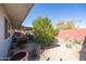 A shaded patio space with desert landscaping at 9834 W Evergreen Dr, Sun City, AZ 85373