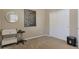 Neutral bedroom featuring carpet, a closet, modern art, and a round mirror at 10778 W Whitehorn Way, Peoria, AZ 85383