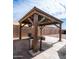 Outdoor gazebo with a stainless steel grill, set on a spacious stone patio at 11460 E Dartmouth St, Mesa, AZ 85207