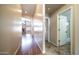 Inviting hallway showcasing the transition to an open concept living area at 11460 E Dartmouth St, Mesa, AZ 85207