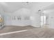 Bright bedroom featuring neutral walls, white trim, and shuttered windows at 1157 N Date Palm Dr, Gilbert, AZ 85234