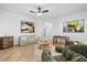 Cozy living room with modern furnishings, stylish decor, and natural light from the window at 1157 N Date Palm Dr, Gilbert, AZ 85234