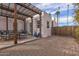 Private patio area with a pergola, brick pavers, and plenty of space for entertaining at 1307 W Palm Ln, Phoenix, AZ 85007