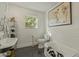 Bright bathroom features subway tile, a modern vanity, and hexagon tile flooring at 1307 W Palm Ln, Phoenix, AZ 85007