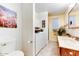 Bright bathroom features a sink, shower, toilet, and nearby laundry at 17200 W Bell Rd # 26, Surprise, AZ 85374