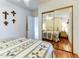 Bedroom with a large closet and decorative touches, reflected in the mirrored closet doors at 17200 W Bell Rd # 26, Surprise, AZ 85374