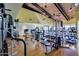 A fitness center with modern exercise equipment, including treadmills, elliptical machines, and weight machines at 17200 W Bell Rd # 26, Surprise, AZ 85374