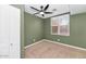 Bedroom with a ceiling fan, olive green walls, and carpet at 17309 E Rosita Dr, Fountain Hills, AZ 85268