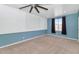 Bedroom featuring blue and white walls, a ceiling fan, and carpet at 17309 E Rosita Dr, Fountain Hills, AZ 85268