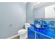 Stylish powder room with a unique vessel sink and modern fixtures at 17309 E Rosita Dr, Fountain Hills, AZ 85268