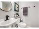 Modern powder bathroom with stylish fixtures and decor at 1865 E Pinto Dr, Gilbert, AZ 85296