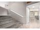 Carpeted stairs and hallway with neutral color palette at 1865 E Pinto Dr, Gilbert, AZ 85296