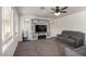 Comfortable living room with a modern entertainment center at 1865 E Pinto Dr, Gilbert, AZ 85296