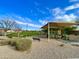 Community playground featuring shade structure, play equipment, park bench and manicured landscaping at 1865 E Pinto Dr, Gilbert, AZ 85296