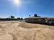 Wide backyard, utility lines visible against a clear blue sky at 2201 N 35Th Dr, Phoenix, AZ 85009