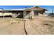 A single-story home featuring a pathway leading to the main entrance at 2201 N 35Th Dr, Phoenix, AZ 85009