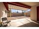 Covered patio with a desert landscaped backyard and a view of surrounding houses at 2205 E Linda Ct, Phoenix, AZ 85022