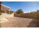 Desert landscaped backyard with gravel, a block wall, and a covered patio at 2205 E Linda Ct, Phoenix, AZ 85022