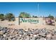 Attractive community sign, 'Northtown - Adult Community,' framed by desert landscaping, creating a welcoming entrance at 2205 E Linda Ct, Phoenix, AZ 85022