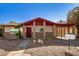 Charming single-story home with brick accents, desert landscaping, and covered carport at 2205 E Linda Ct, Phoenix, AZ 85022