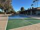 Well-maintained pickleball court with net, providing a recreational area for active community engagement at 2205 E Linda Ct, Phoenix, AZ 85022