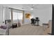 Bedroom with light carpet, a large window, and guitar at 2226 E Parkside Ln, Phoenix, AZ 85024