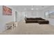 Bright living room showcasing comfortable seating, a table with chairs, and neutral carpet flooring for a cozy atmosphere at 2226 E Parkside Ln, Phoenix, AZ 85024